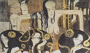 Une vieille femme nue et décharnée aux cheveux noirs et aux yeux exorbités surplombe les têtes de trois jeunes femmes sur fond de dorures.